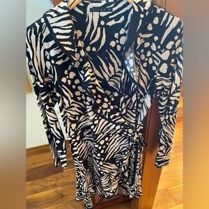 Effortlessly chic cream and black wrap dress